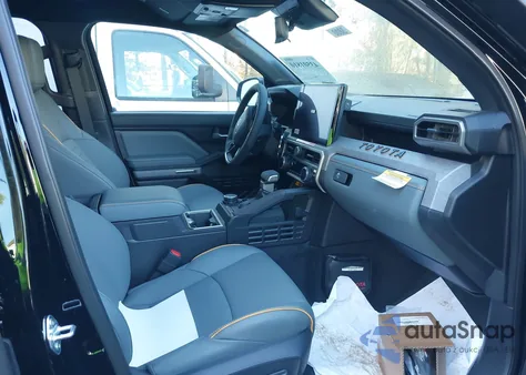 2025 Toyota Tacoma Hybrid Trailhunter from USA, damaged, VIN 3TYLC5LN0ST039894